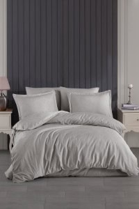 Visoka kvaliteta pamuk satenska posteljina u bijeloj boji, elegantan dizajn za udoban san i modernu spavaću sobu.