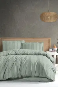 DAPHNE Clasy pamuk puplin posteljina set u zelenoj boji, savršen za modernu spavaću sobu, izrađena od visokokvalitetnog pamuka za udobnost i dugotrajnost. Idealno za osveženje vašeg prostora.