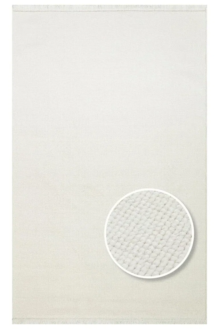 Beli bijeli tepih Oslo s jednostavnim, modernim dizajnom, savršen za svaki enterijer, pruža udobnost i eleganciju u vašem domu ili uredu. Idealno za minimalistički stil uređenja prostora.