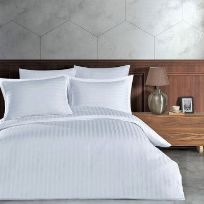 Visokokvalitetni posteljni set od pamuk satena s damast uzorkom, idealan za hotelski smještaj, pruža luksuzan i udoban san.