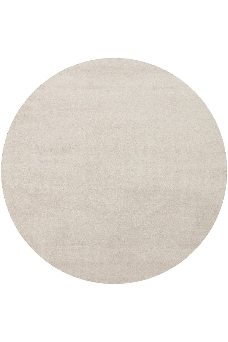 Bež okrugli tepih Zen od D. Stone, savršen za moderni i minimalistički enterijer, izrađen od visokokvalitetnih materijala, pruža udobnost i eleganciju u svakom prostoru.