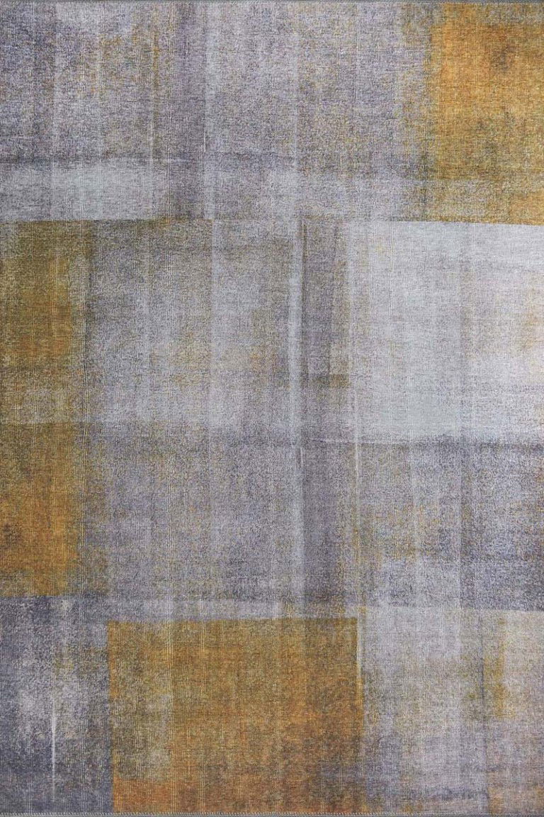 Uljepsani tepih M10 s modernim apstraktni dizajnom u neutralnim tonovima za elegantan izgled doma ili poslovnog prostora.